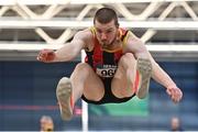 18 February 2023; Daniel Ryan of Moycarkey Coolcroo AC, Tipperary, competing in the senior men's Long Jump during day one of the 123.ie National Senior Indoor Championships at National Indoor Arena in Dublin. Photo by Sam Barnes/Sportsfile
