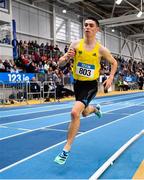 18 February 2023; Darragh McElhinney of UCD AC, Dublin, on his way to winning the senior men's 3000m during day one of the 123.ie National Senior Indoor Championships at National Indoor Arena in Dublin. Photo by Sam Barnes/Sportsfile