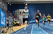 18 February 2023; Mark Smyth of Raheny Shamrock AC, Dublin, left, on his way to winning the senior men's 200m  during day one of the 123.ie National Senior Indoor Championships at National Indoor Arena in Dublin. Photo by Sam Barnes/Sportsfile