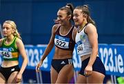 18 February 2023; Sharlene Mawdsley of Newport AC, Tipperary, 522, is congratulated by Lauren Cadden of Sligo AC, right, after winning the senior women's 200m  during day one of the 123.ie National Senior Indoor Championships at National Indoor Arena in Dublin. Photo by Sam Barnes/Sportsfile