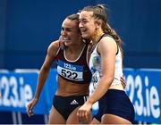 18 February 2023; Sharlene Mawdsley of Newport AC, Tipperary, left, is congratulated by Lauren Cadden of Sligo AC, right, after winning the senior women's 200m  during day one of the 123.ie National Senior Indoor Championships at National Indoor Arena in Dublin. Photo by Sam Barnes/Sportsfile