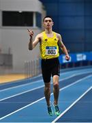 18 February 2023; Darragh McElhinney of UCD AC, Dublin, celebrates on his way to winning the senior men's 3000m  during day one of the 123.ie National Senior Indoor Championships at National Indoor Arena in Dublin. Photo by Sam Barnes/Sportsfile