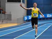 18 February 2023; Darragh McElhinney of UCD AC, Dublin, celebrates on his way to winning the senior men's 3000m during day one of the 123.ie National Senior Indoor Championships at National Indoor Arena in Dublin. Photo by Sam Barnes/Sportsfile