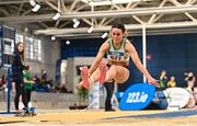 18 February 2023; Saragh Buggy of St Abbans AC, Laois, on her way to winning the senior women's Triple Jump  during day one of the 123.ie National Senior Indoor Championships at National Indoor Arena in Dublin. Photo by Sam Barnes/Sportsfile