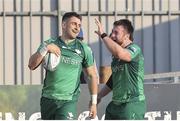 18 February 2023; Tiernan O’Halloran of Connacht, left, celebrates with teammate Dylan Tierney-Martin after scoring his side's try during the United Rugby Championship match between Zebre Parma and Connacht at Stadio Sergio Lanfranchi in Parma, Italy. Photo by Massimiliano Carnabuci/Sportsfile