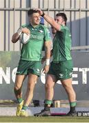 18 February 2023; Tiernan O’Halloran of Connacht, left, celebrates with teammate Dylan Tierney-Martin after scoring his side's try during the United Rugby Championship match between Zebre Parma and Connacht at Stadio Sergio Lanfranchi in Parma, Italy. Photo by Massimiliano Carnabuci/Sportsfile