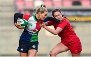 18 February 2023; Aoife Doyle of Combined Provinces XV is tackled by Caitlin Lewis of Wales Development XV during the Celtic Challenge 2023 match between Combined Provinces XV and Welsh Development XV at Kingspan Stadium in Belfast. Photo by Ramsey Cardy/Sportsfile