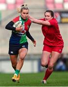 18 February 2023; Aoife Doyle of Combined Provinces XV is tackled by Caitlin Lewis of Wales Development XV during the Celtic Challenge 2023 match between Combined Provinces XV and Welsh Development XV at Kingspan Stadium in Belfast. Photo by Ramsey Cardy/Sportsfile