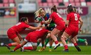 18 February 2023; Aoife Doyle of Combined Provinces XV is tackled by Wales Development XV players, from left, Molly Phillpot, Jenna De Vera and Kate Williams during the Celtic Challenge 2023 match between Combined Provinces XV and Welsh Development XV at Kingspan Stadium in Belfast. Photo by Ramsey Cardy/Sportsfile