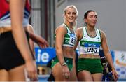 18 February 2023; Sarah Lavin of Emerald AC, Limerick, centre, is congratulated by Tara Meier of Raheny Shamrock AC, Dublin, after winning the senior women's 60m Hurdles during day one of the 123.ie National Senior Indoor Championships at National Indoor Arena in Dublin. Photo by Sam Barnes/Sportsfile