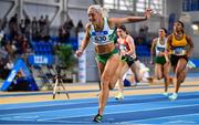 18 February 2023; Sarah Lavin of Emerald AC, Limerick, crosses the line to win the senior women's 60m Hurdles during day one of the 123.ie National Senior Indoor Championships at National Indoor Arena in Dublin. Photo by Sam Barnes/Sportsfile