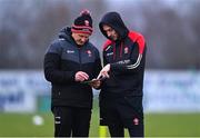 18 February 2023; Derry manager Rory Gallagher, right, with backroom staff Ciaran Meenagh in conversation before the Allianz Football League Division Two match between Derry and Meath at Derry GAA Centre of Excellence in Owenbeg, Derry. Photo by Ben McShane/Sportsfile