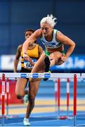 18 February 2023; Sarah Lavin of Emerald AC, Limerick, on her way to winning the senior women's 60m Hurdles during day one of the 123.ie National Senior Indoor Championships at National Indoor Arena in Dublin. Photo by Sam Barnes/Sportsfile