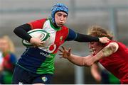 18 February 2023; Clodagh O'Halloran of Combined Provinces XV is tackled by Abbie Fleming of Wales Development XV during the Celtic Challenge 2023 match between Combined Provinces XV and Welsh Development XV at Kingspan Stadium in Belfast. Photo by Ramsey Cardy/Sportsfile