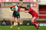 18 February 2023; Aoife Doyle of Combined Provinces XV is tackled by Caitlin Lewis of Wales Development XV during the Celtic Challenge 2023 match between Combined Provinces XV and Welsh Development XV at Kingspan Stadium in Belfast. Photo by Ramsey Cardy/Sportsfile