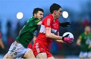 18 February 2023; Paul Cassidy of Derry in action against Jack O'Connor of Meath during the Allianz Football League Division Two match between Derry and Meath at Derry GAA Centre of Excellence in Owenbeg, Derry. Photo by Ben McShane/Sportsfile