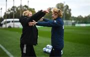 17 February 2023; Republic of Ireland manager Vera Pauw, right, and Germany manager Martina Voss-Tecklenburg before a behind closed doors training match between Republic of Ireland and Germany at Marbella Football Centre in Marbella, Spain. Photo by Stephen McCarthy/Sportsfile