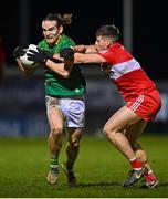 18 February 2023; Cillian O'Sullivan of Meath in action against Conor Doherty of Derry during the Allianz Football League Division Two match between Derry and Meath at Derry GAA Centre of Excellence in Owenbeg, Derry. Photo by Ben McShane/Sportsfile