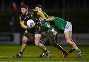 18 February 2023; Derry goalkeeper Odhran Lynch is tackled by Donal Keogan of Meath during the Allianz Football League Division Two match between Derry and Meath at Derry GAA Centre of Excellence in Owenbeg, Derry. Photo by Ben McShane/Sportsfile