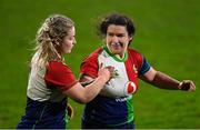 18 February 2023; Sadhbh McGrath, left, and Christy Haney of Combined Provinces XV fistbump as they are substituted during the Celtic Challenge 2023 match between Combined Provinces XV and Welsh Development XV at Kingspan Stadium in Belfast. Photo by Ramsey Cardy/Sportsfile
