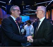 17 February 2023; GAA president elect Jarlath Burns, left, is congratulated by fellow GAA presidential candidate Pat Teehan after the result of the vote on day one of the GAA Annual Congress 2023 at Croke Park in Dublin. Photo by Piaras Ó Mídheach/Sportsfile