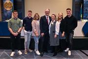 17 February 2023; GAA president elect Jarlath Burns, centre, alongside his wife Suzanne, and his children, from left, Fionnan, Conall, Ellen, Megan and Jarly Óg during day one of the GAA Annual Congress 2023 at Croke Park in Dublin. Photo by Piaras Ó Mídheach/Sportsfile