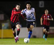 18 February 2023; Sam Verdon of Longford Town in action against Charles Mutawe of Athlone Town during the SSE Airtricity Men's First Division match between Longford Town and Athlone Town at Bishopsgate in Longford. Photo by Michael P Ryan/Sportsfile