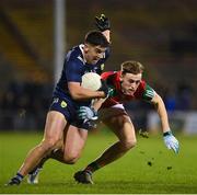 18 February 2023; Tony Brosnan of Kerry is tackled by Donnacha McHugh of Mayo during the Allianz Football League Division One match between Mayo and Kerry at Hastings Insurance MacHale Park in Castlebar, Mayo. Photo by Brendan Moran/Sportsfile