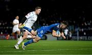 18 February 2023; Luke McGrath of Leinster dives over to score his side's second try during the United Rugby Championship match between Leinster and Dragons at RDS Arena in Dublin. Photo by Harry Murphy/Sportsfile