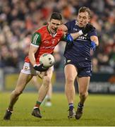 18 February 2023; Conor Loftus of Mayo is tackled by Dara Moynihan of Kerry during the Allianz Football League Division One match between Mayo and Kerry at Hastings Insurance MacHale Park in Castlebar, Mayo. Photo by Brendan Moran/Sportsfile