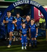 18 February 2023; Leinster captain Rhys Ruddock with matchday mascots Riley Byrne, aged five, left, and Niamh Kane, aged nine, before the United Rugby Championship match between Leinster and Dragons at RDS Arena in Dublin. Photo by Harry Murphy/Sportsfile