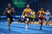 19 February 2023; Conor Morey of Leevale AC, Cork, centre, and Chris Sibanda of Clonliffe Harriers AC, Dublin, competing in the senior men's 60m during day two of the 123.ie National Senior Indoor Championships at National Indoor Arena in Dublin. Photo by Tyler Miller/Sportsfile