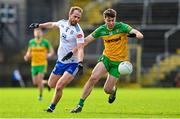 19 February 2023; Conor O'Donnell of Donegal in action against Conor Boyle of Monaghan during the Allianz Football League Division One match between Monaghan and Donegal at St Tiernach's Park in Clones, Monaghan. Photo by Ramsey Cardy/Sportsfile