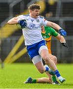 19 February 2023; Darren Hughes of Monaghan in action against Hugh McFadden of Donegal during the Allianz Football League Division One match between Monaghan and Donegal at St Tiernach's Park in Clones, Monaghan. Photo by Ramsey Cardy/Sportsfile