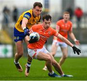 19 February 2023; Barry McCambridge of Armagh in action against Enda Smith of Roscommon during the Allianz Football League Division One match between Roscommon and Armagh at Dr Hyde Park in Roscommon. Photo by Harry Murphy/Sportsfile