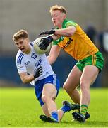 19 February 2023; Karl Gallagher of Monaghan in action against Oisin Gallen of Donegal during the Allianz Football League Division One match between Monaghan and Donegal at St Tiernach's Park in Clones, Monaghan. Photo by Ramsey Cardy/Sportsfile