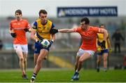 19 February 2023; Enda Smith of Roscommon in action against Barry McCambridge of Armagh during the Allianz Football League Division One match between Roscommon and Armagh at Dr Hyde Park in Roscommon. Photo by Harry Murphy/Sportsfile