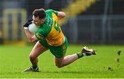 19 February 2023; Caolan McColgan of Donegal slips during the Allianz Football League Division One match between Monaghan and Donegal at St Tiernach's Park in Clones, Monaghan. Photo by Ramsey Cardy/Sportsfile