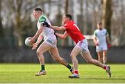 19 February 2023; Iain Corbett of Limerick in action against Conal McKeever of Louth during the Allianz Football League Division Two match between Louth and Limerick at Páirc Mhuire in Ardee, Louth. Photo by Ben McShane/Sportsfile