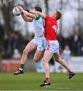 19 February 2023; Hugh Bourke of Limerick in action against Donal McKenny of Louth during the Allianz Football League Division Two match between Louth and Limerick at Páirc Mhuire in Ardee, Louth. Photo by Ben McShane/Sportsfile