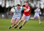 19 February 2023; Hugh Bourke of Limerick in action against Donal McKenny of Louth during the Allianz Football League Division Two match between Louth and Limerick at Páirc Mhuire in Ardee, Louth. Photo by Ben McShane/Sportsfile