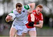 19 February 2023; Hugh Bourke of Limerick in action against Donal McKenny of Louth during the Allianz Football League Division Two match between Louth and Limerick at Páirc Mhuire in Ardee, Louth. Photo by Ben McShane/Sportsfile