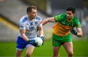 19 February 2023; Jack McCarron of Monaghan in action against Brendan McCole of Donegal during the Allianz Football League Division One match between Monaghan and Donegal at St Tiernach's Park in Clones, Monaghan. Photo by Philip Fitzpatrick/Sportsfile