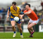 19 February 2023; Diarmuid Murtagh of Roscommon in action against  Aidan Forker of Armagh during the Allianz Football League Division One match between Roscommon and Armagh at Dr Hyde Park in Roscommon. Photo by Harry Murphy/Sportsfile