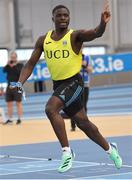 19 February 2023; Israel Olatunde of UCD AC, Dublin, celebrates after winning the senior men's 60m Final during day two of the 123.ie National Senior Indoor Championships at National Indoor Arena in Dublin. Photo by Tyler Miller/Sportsfile