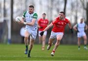 19 February 2023; Brian Fanning of Limerick in action against Conal McKeever of Louth during the Allianz Football League Division Two match between Louth and Limerick at Páirc Mhuire in Ardee, Louth. Photo by Ben McShane/Sportsfile