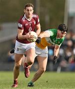 19 February 2023; Sam Duncan of Westmeath in action against Bill Carroll of Offaly during the Allianz Football League Division Three match between Westmeath and Offaly at TEG Cusack Park in Mullingar, Westmeath. Photo by Stephen Marken/Sportsfile