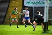 19 February 2023; Gary Mohan of Monaghan in action against Stephen McMenamin of Donegal during the Allianz Football League Division One match between Monaghan and Donegal at St Tiernach's Park in Clones, Monaghan. Photo by Philip Fitzpatrick/Sportsfile