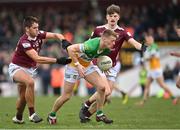 19 February 2023; Peter Cunningham of Offaly in action against Conor McCormack and Senan Baker of Westmeath  during the Allianz Football League Division Three match between Westmeath and Offaly at TEG Cusack Park in Mullingar, Westmeath. Photo by Stephen Marken/Sportsfile