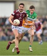 19 February 2023; Sam Duncan of Westmeath in action against Dylan Hyland of Offaly during the Allianz Football League Division Three match between Westmeath and Offaly at TEG Cusack Park in Mullingar, Westmeath. Photo by Stephen Marken/Sportsfile